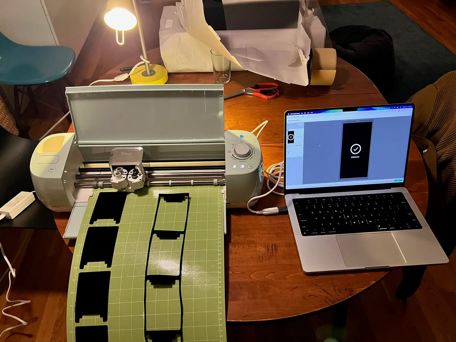 CNC cutter with interior flocking material and laptop