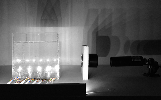 Bubble Display volumetric water tank with electrolysis patterns